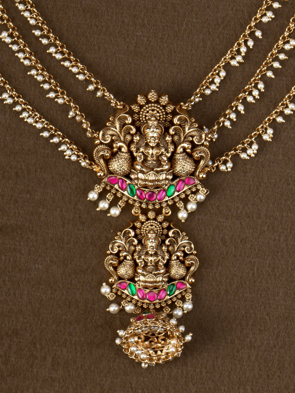 Shri Lakshmi Three Line - close-up of Lakshmi and peacock motifs with kemp stones