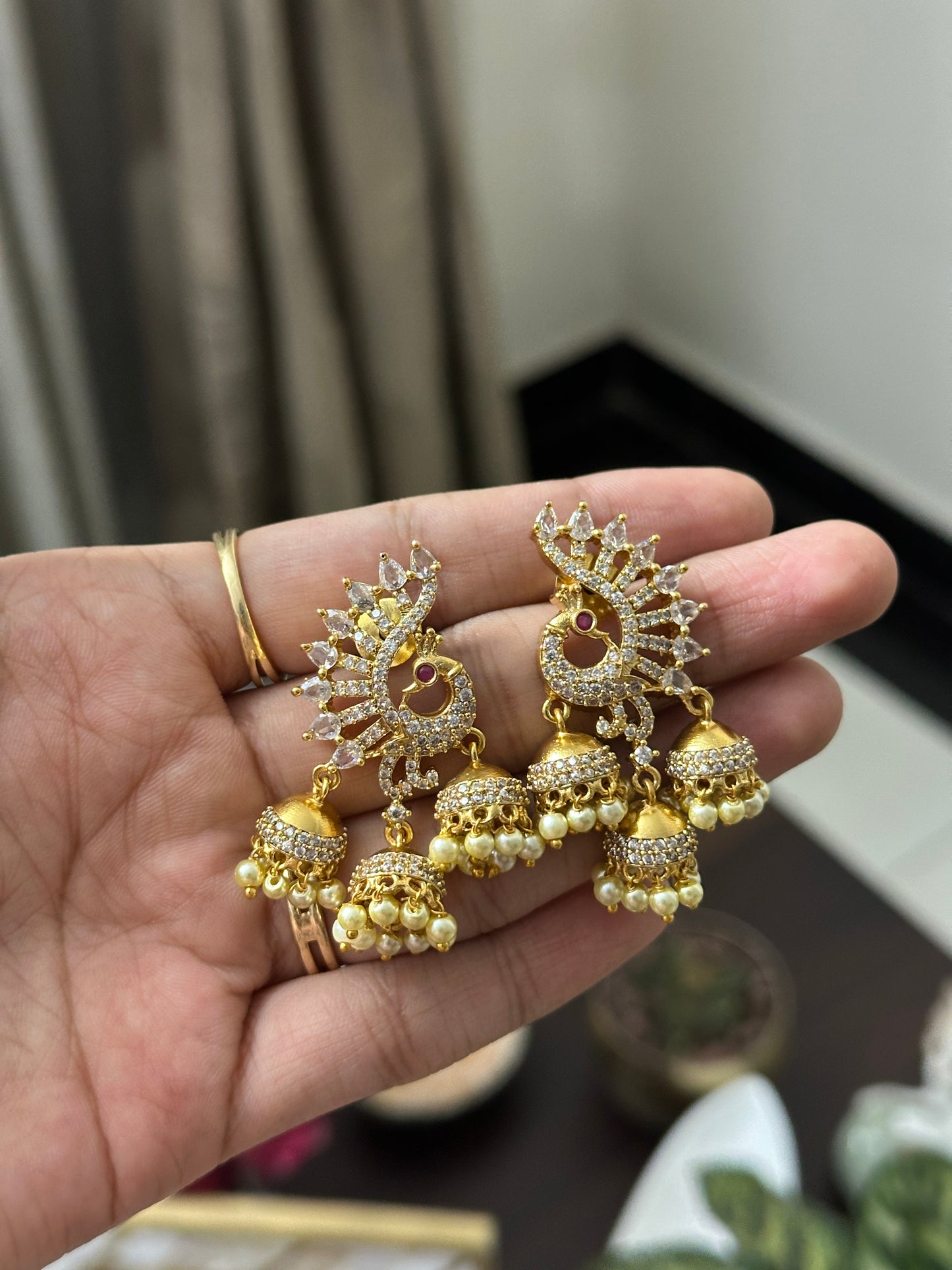 Tri Jhumka Peacock Earrings