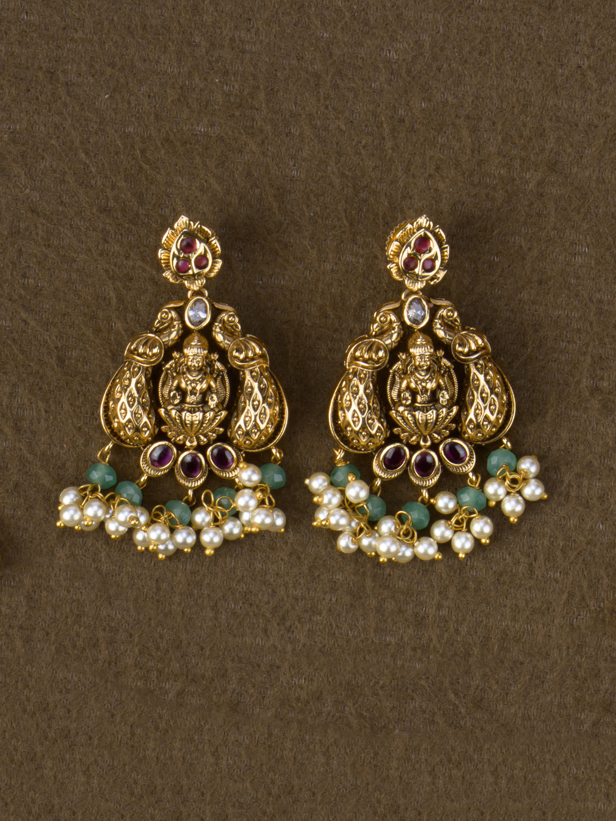 Matching Lakshmi peacock drop earrings