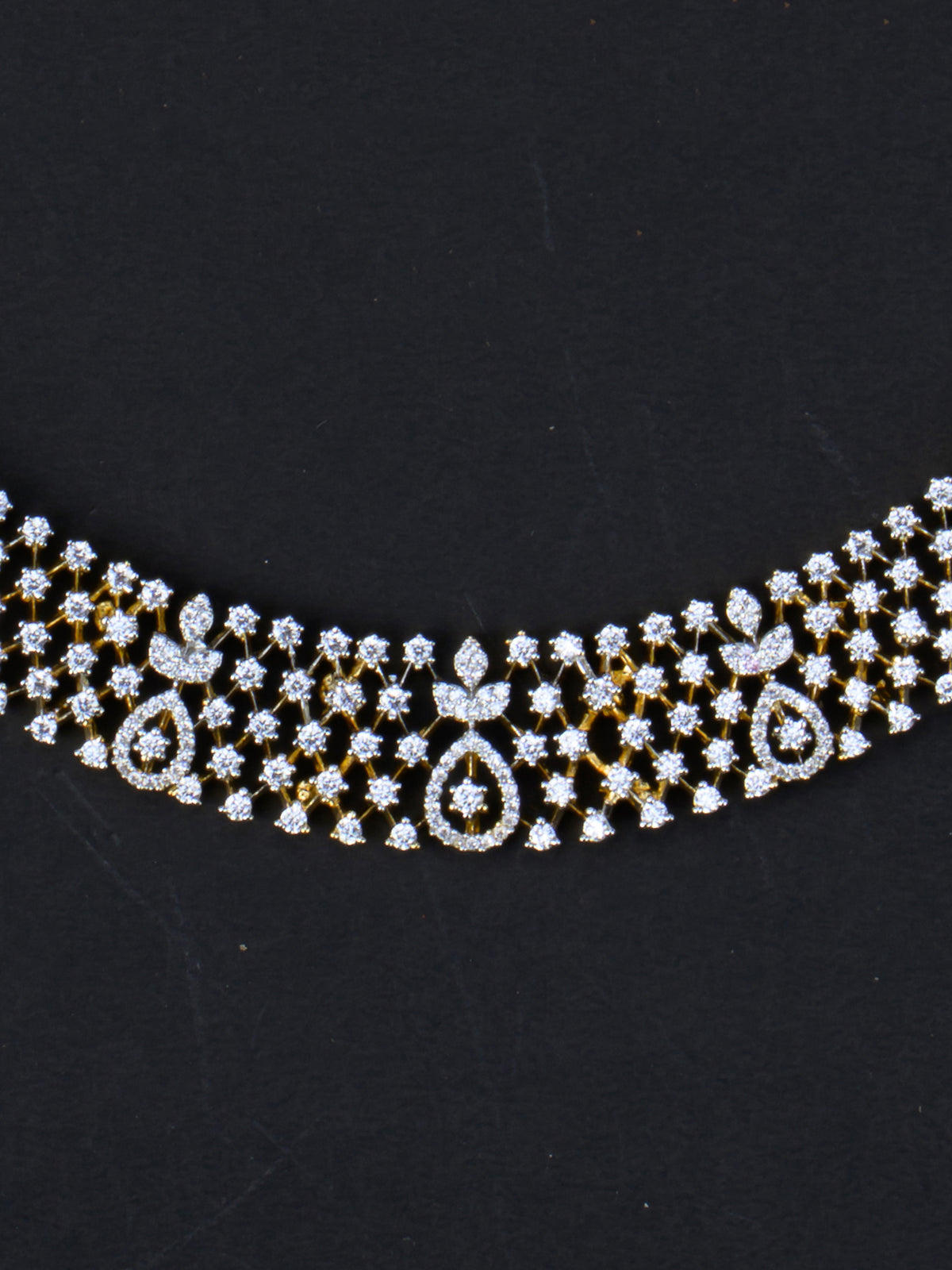 Pallavi AD Necklace Set - Gold Polish necklace close-up